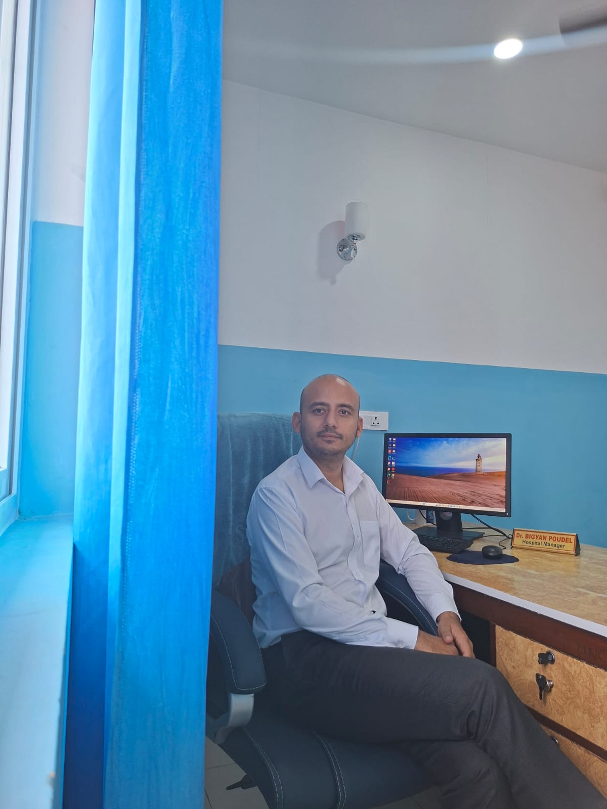 Dr. Bigyan Poudel at the Hospital Manager’s desk, Bharatpur Hospital