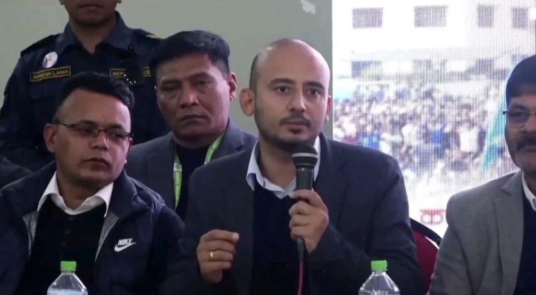 Dr. Bigyan Poudel speaking at a public health program